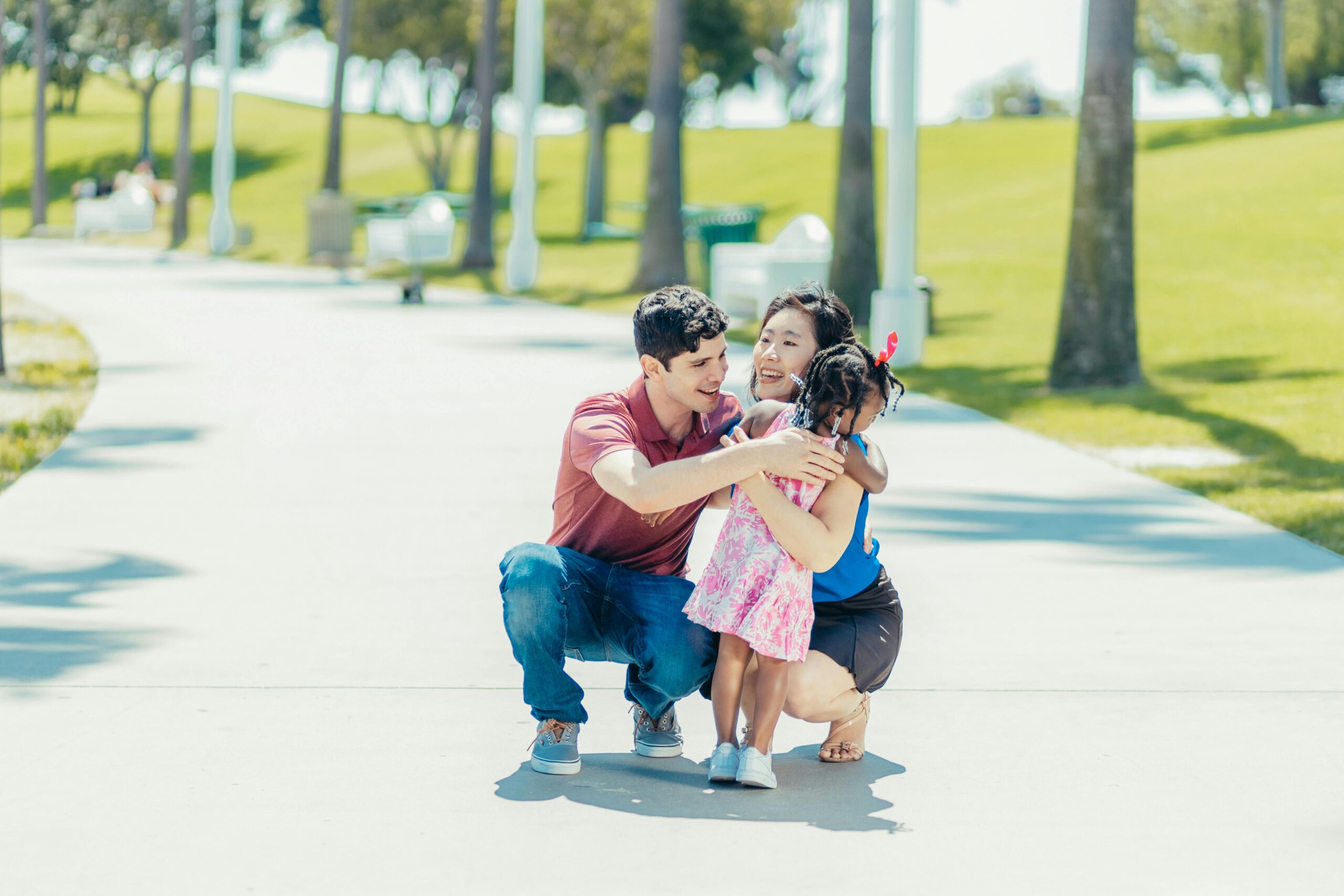 A Happy Family Playing Hugging