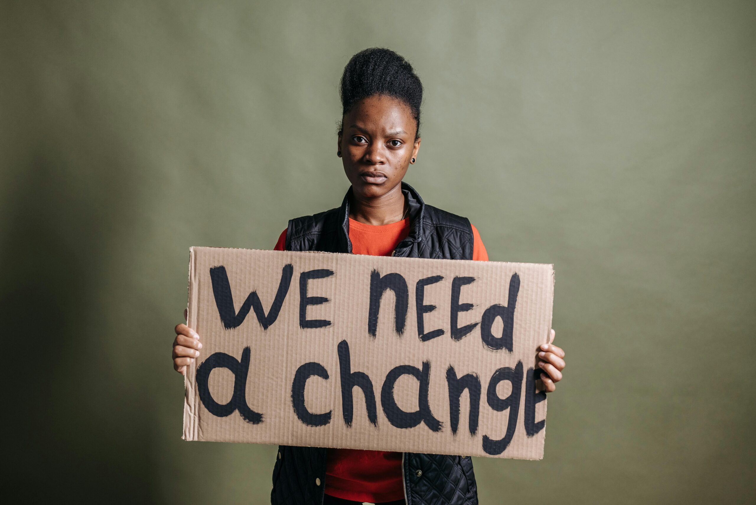 A Woman Holding a Placard