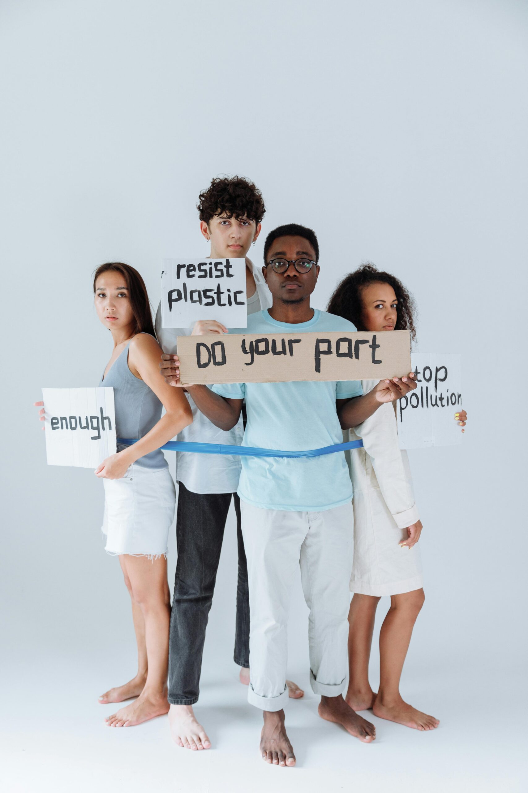 People Standing Together Holing Placards